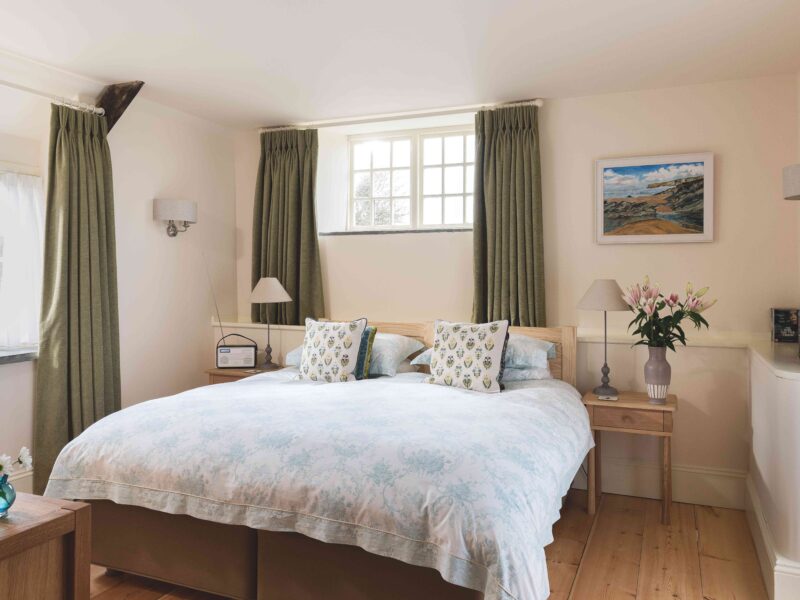Atlantic Haven features a cosy bedroom for a romantic retreat.