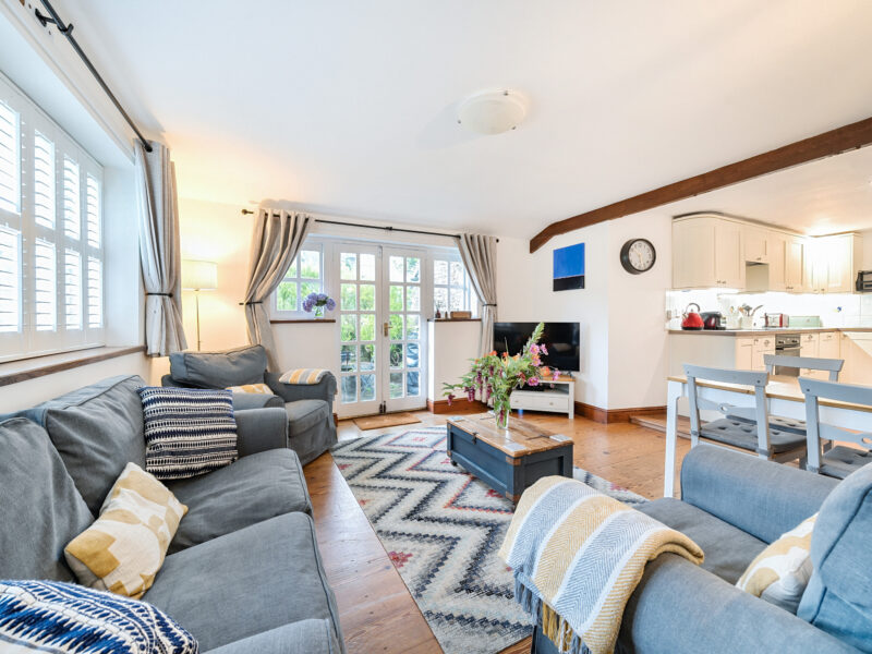 A charming and comfortable living room at The Curates Wing.