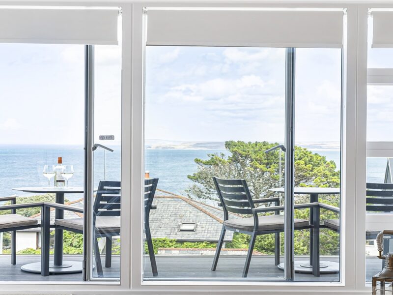 Stunning sea view from a balcony at Cornish Secrets holiday accommodation.