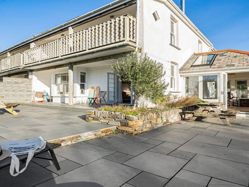 Stylish seaside holiday home with outdoor terrace in Cornwall, perfect for relaxing stays.