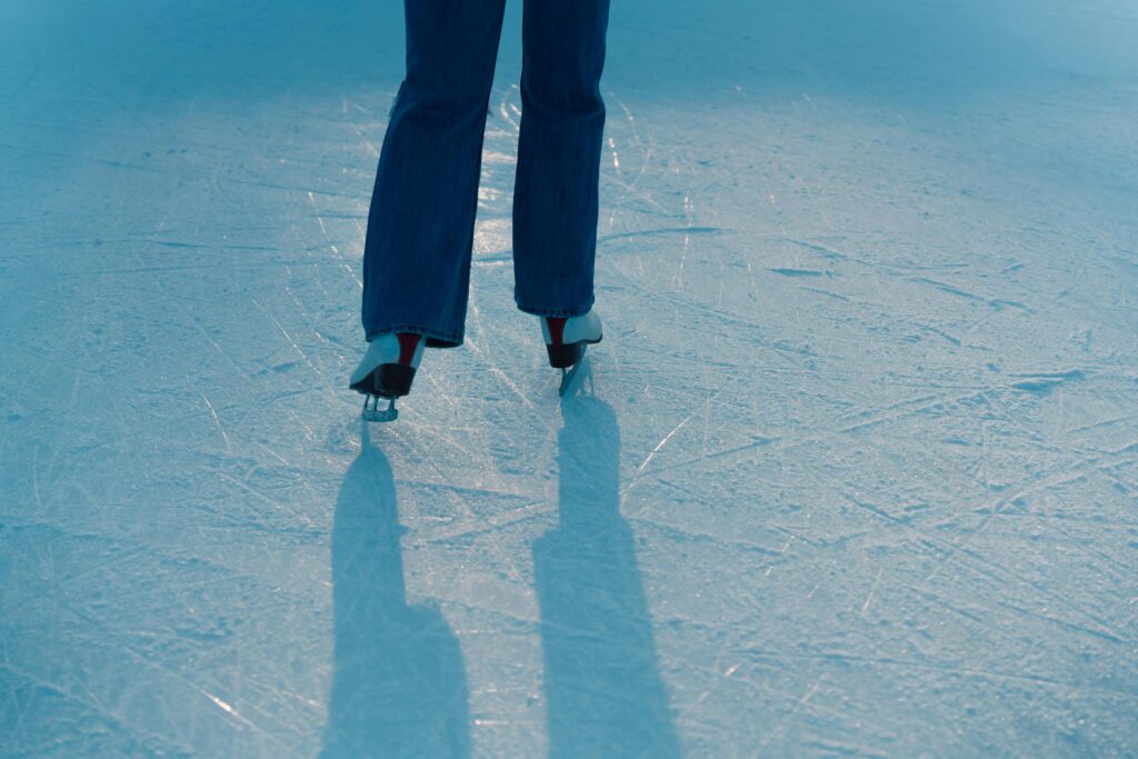 Ice skating shoes on an ice rink at Cornish Secrets. Enjoy winter activities and skating experiences in Cornwall.