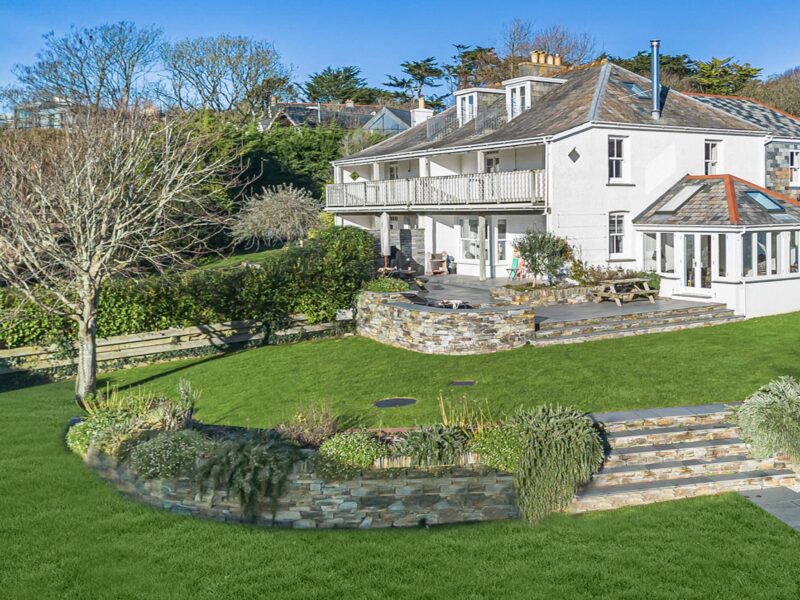 Luxury seaside villa with landscaped garden and panoramic views.