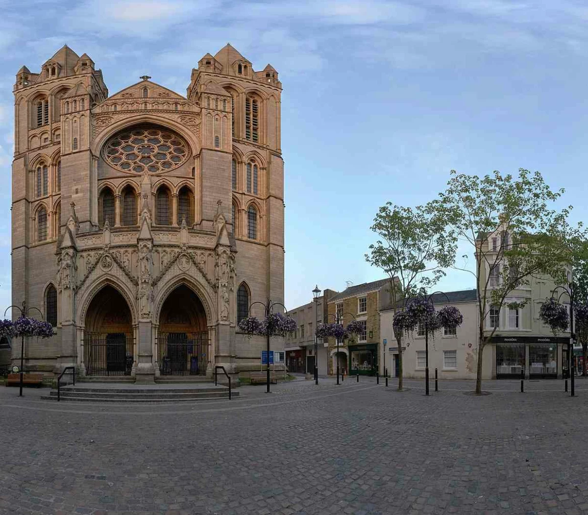 1233px-Truro_High_Cross_5_6_6a_and_Cathedral_west_facade